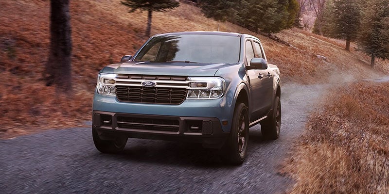 Ford Maverick parked near mountain road